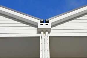 Gutters vs. Downspouts (The Differences and Purpose of Each)