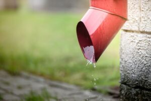Why Is My Downspout Vibrating? (5 Common Causes)